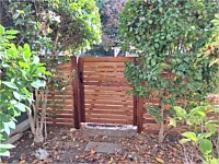 <b>5' high Cedar Horizontal Board Fence  Boards 4 inch Cedar spaced apart with matching gate</b>